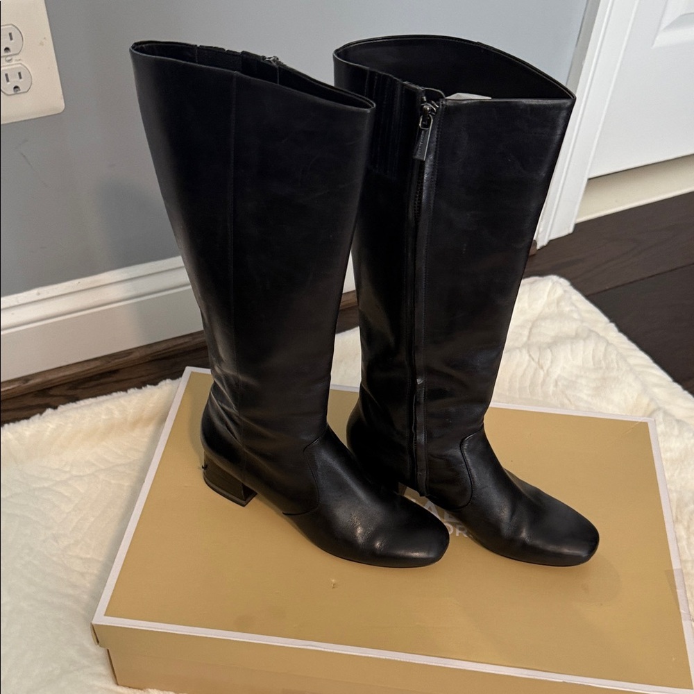 Michael Kors Black Knee high Boots with embossed heel and silver trim. Size: 8M